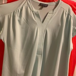 light green blouse, never worn